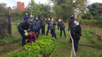 Students from the Santo Alberto Magno Institute working in the school’s community garden.